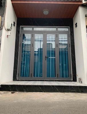 Tôi bán nhà 60 m2, 1 trệt. 1 lầu. Ôtô đậu trước nhà. Tuyệt đẹp. Quận 7