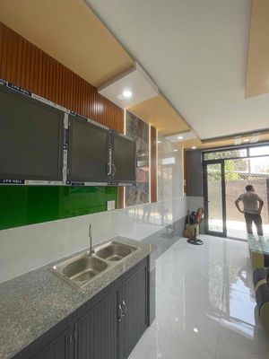 Bán nhà 1 trệch 1 lầu , cầu lớn, hóc môn , tphcm