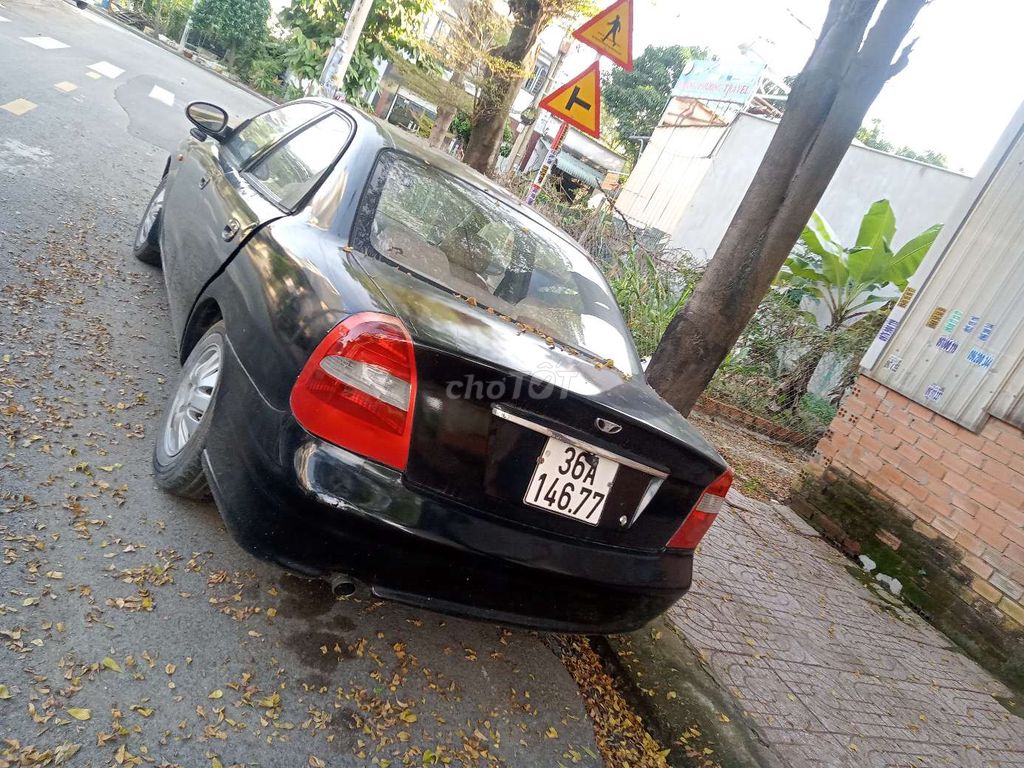 Daewoo Nubira Đen Số sàn. Mua bán Ô tô tại Thành phố Dĩ An Bình Dương được đăng bởi Minh hình 4