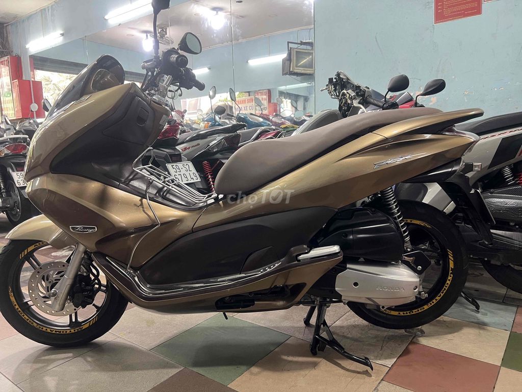 mới về (PCX) màu cánh dám xe zin nguyên chiếc ac. Mua bán Xe máy tại Quận Phú Nhuận Tp Hồ Chí Minh được đăng bởi CuBi Thanh Sơn hình 4