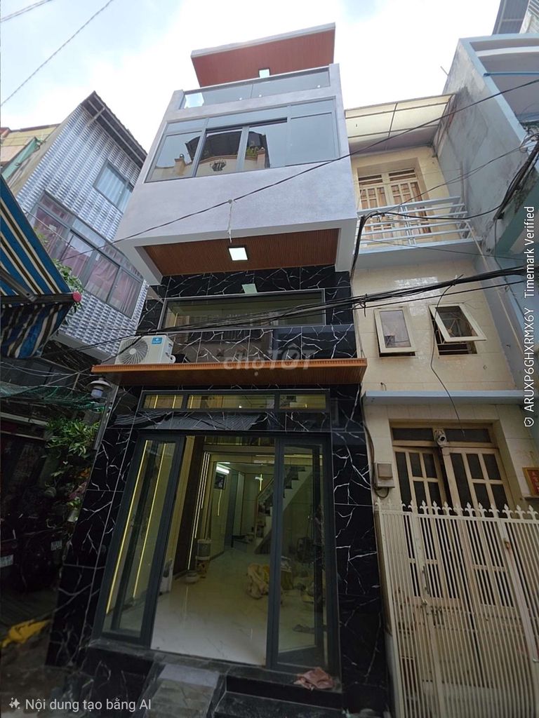 Nhà nở hậu 5.4m × 8m đúc 4 tầng đường An Bình