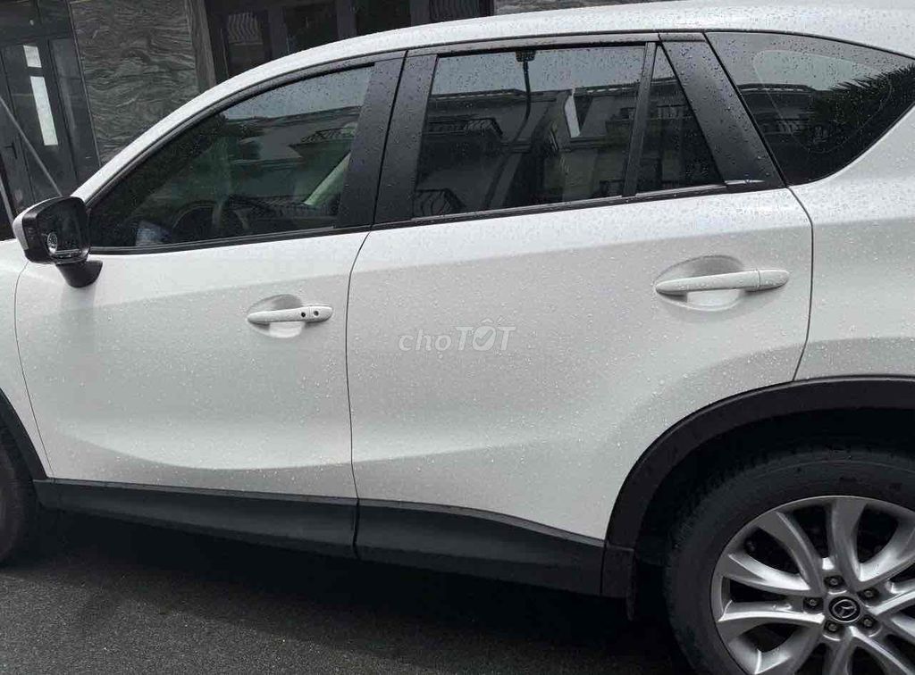 Mazda CX-5 2.0 AT 2014 белая 92000 км