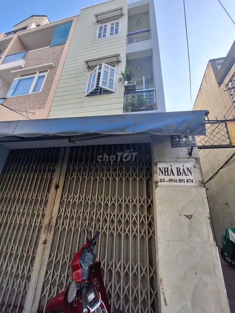 Nhà hai mặt tiền đường Đoàn Văn Bơ,  thuận tiện kinh doanh
