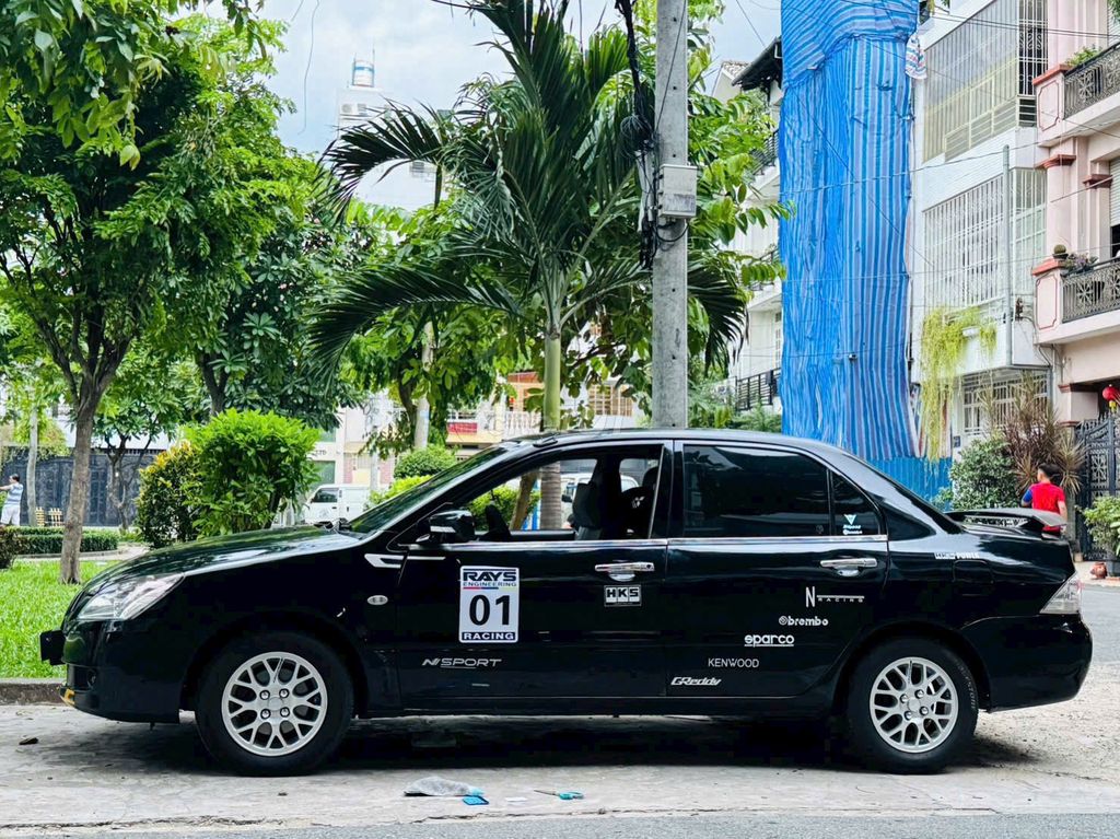 Mitsubishi Lancer Đen 5 chỗ. Mua bán Ô tô tại Quận Tân Bình Tp Hồ Chí Minh được đăng bởi Đào Hữu Lộc hình 3
