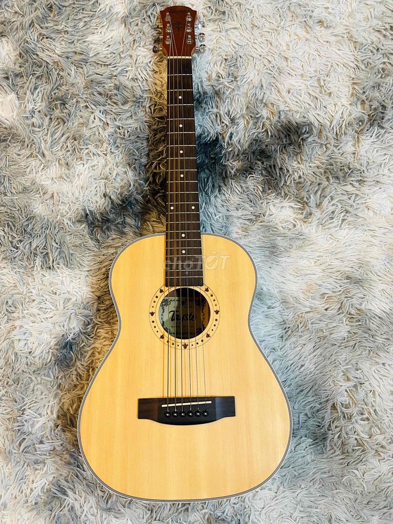 Đàn Guitar mini mới 99% chất lượng tốt