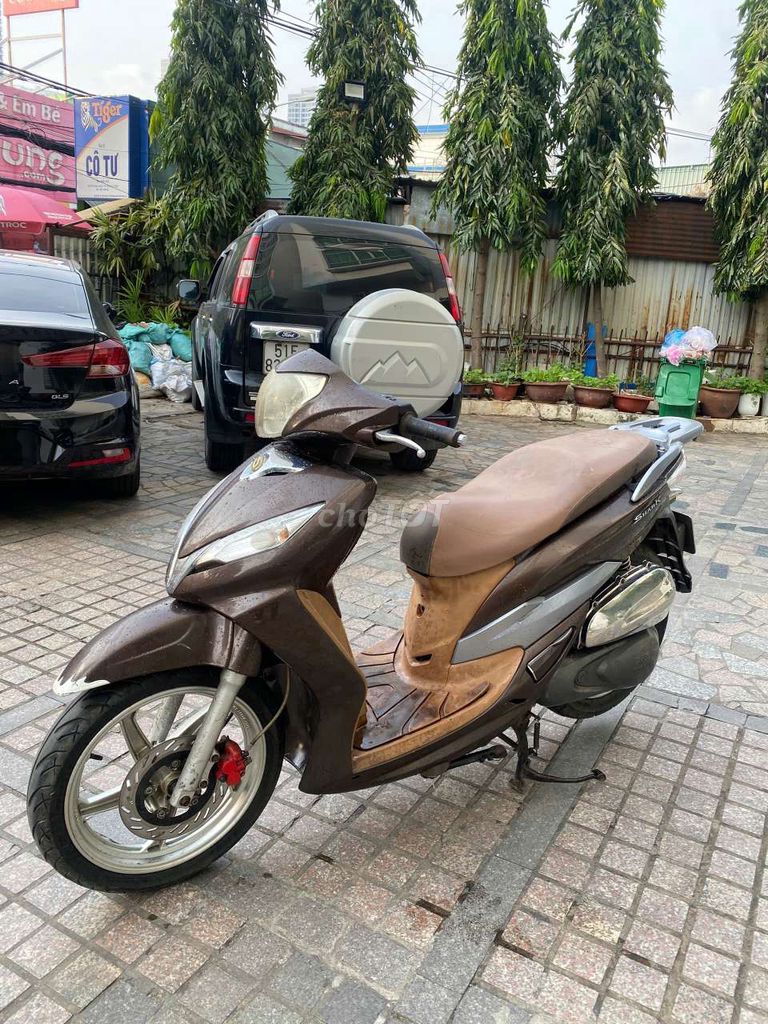 SYM Shark màu Nâu. Mua bán Xe máy tại Quận 7 Tp Hồ Chí Minh được đăng bởi trình minh sơn hình 2