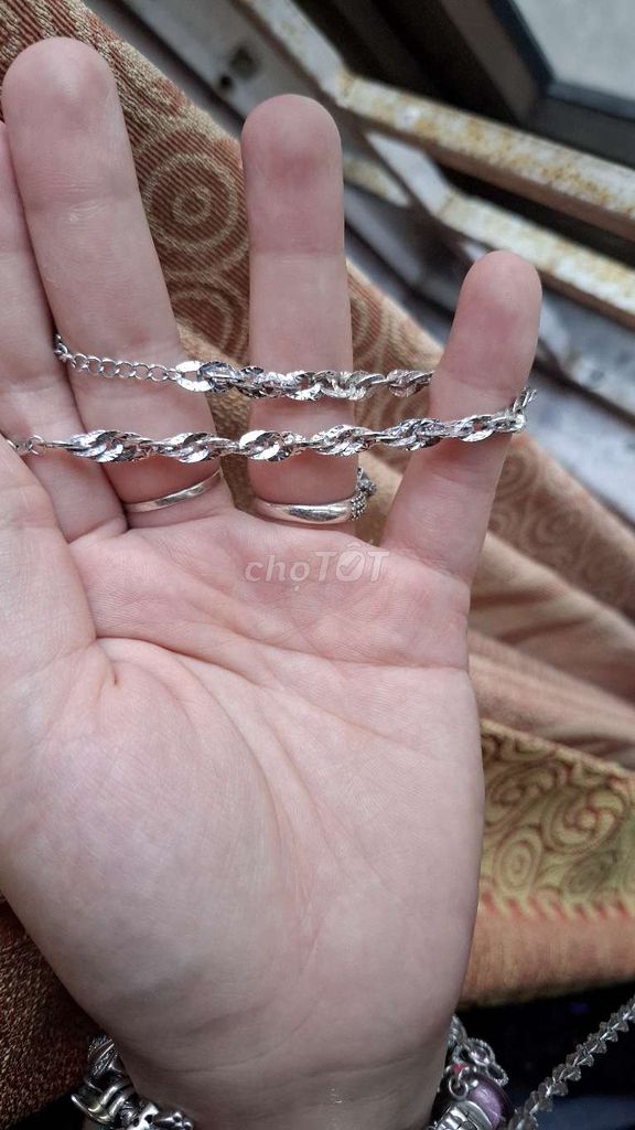 Dây chuyền , lắc tay xoắn bạc xi kim PNJ