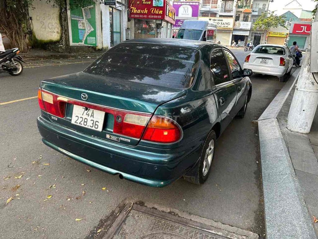 Mazda 323 2000 GLX 1.6MT - 252211 km. Mua bán Ô tô tại Thành phố Thủ Dầu Một Bình Dương được đăng bởi Ô TÔ CŨ BÌNH DƯƠNG hình 3