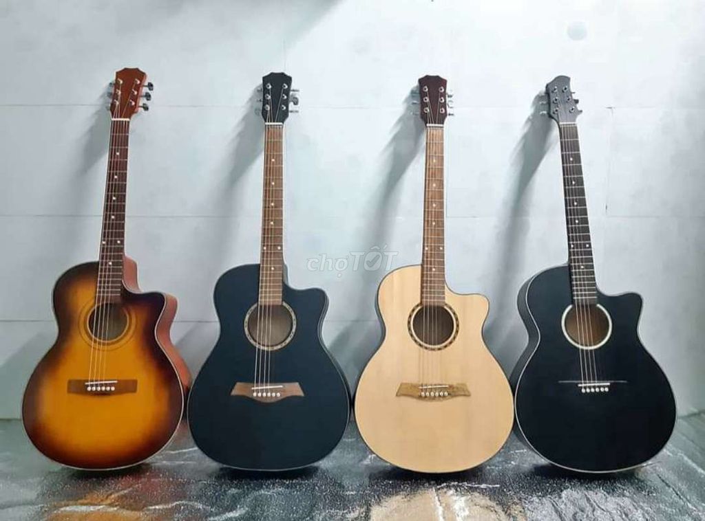 Đàn guitar acoustic dáng khuyết . Mua bán Nhạc cụ tại Quận 7 Tp Hồ Chí Minh được đăng bởi Guitar Saigon hình 1