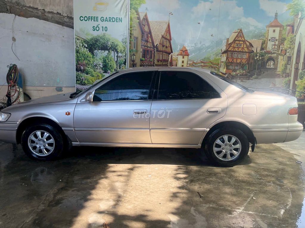 Toyota Camry 1999 - 99999 km. Mua bán Ô tô tại Huyện Vũng Liêm Vĩnh Long được đăng bởi QUOC HUYNH hình 12