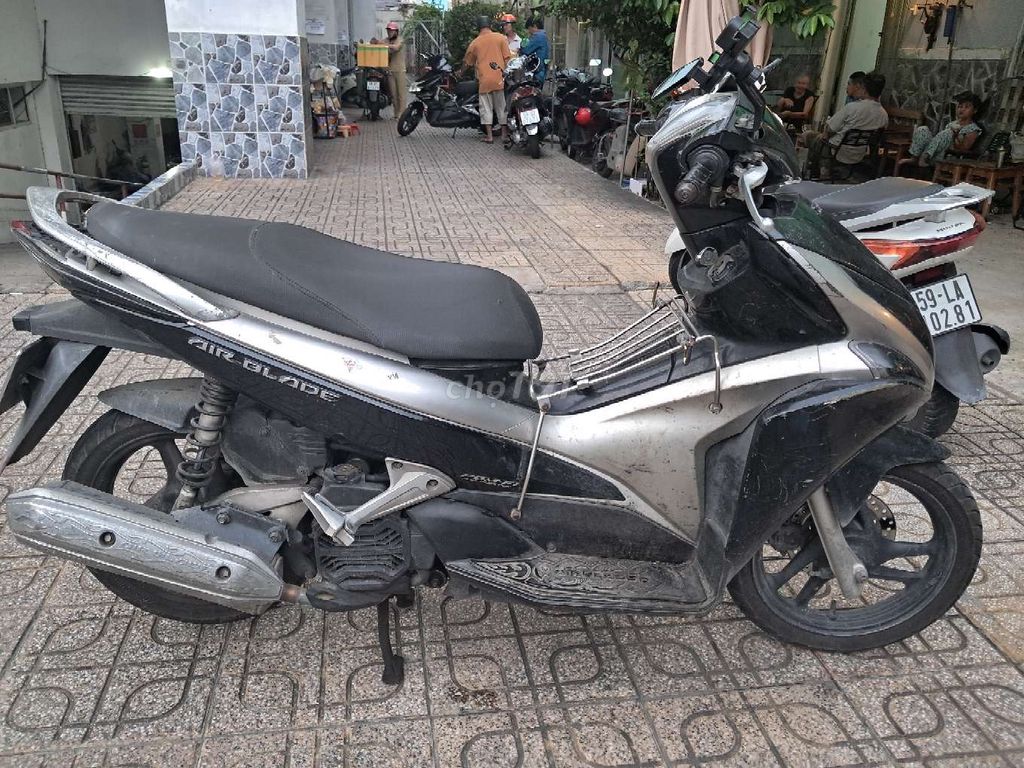 Спортивный Honda Air Blade Fi черный с серебром