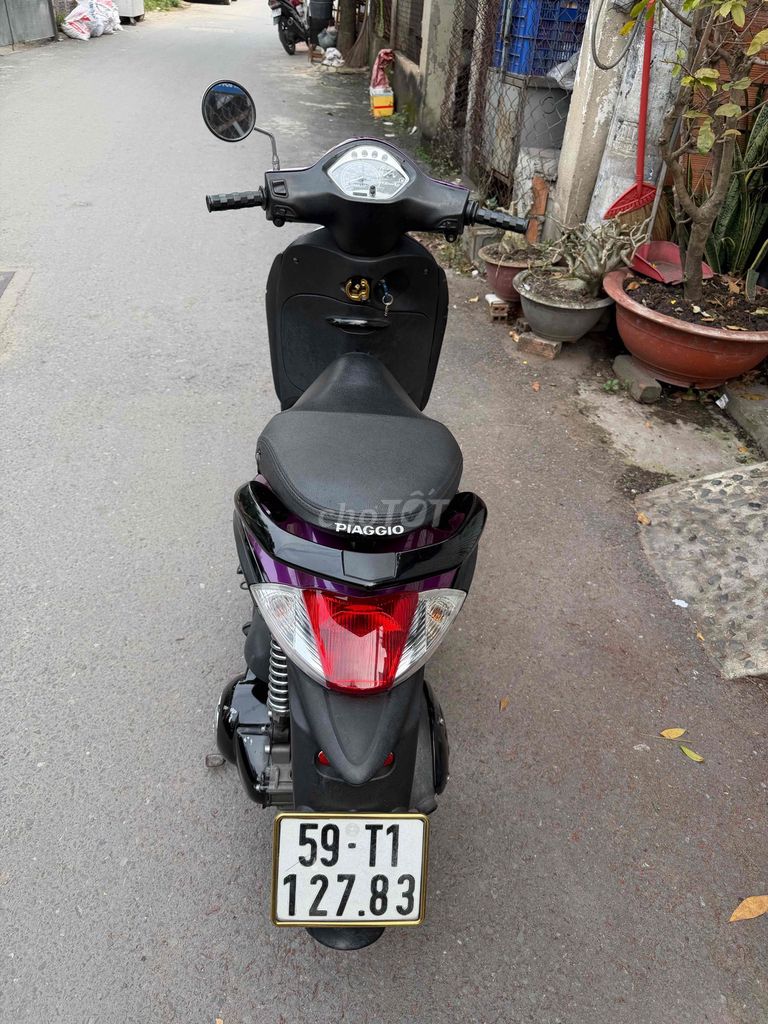 Piaggio Liberty 2011 màu Tím. Mua bán Xe máy tại Huyện Hóc Môn Tp Hồ Chí Minh được đăng bởi Hoàng Anh Tuấn hình 4