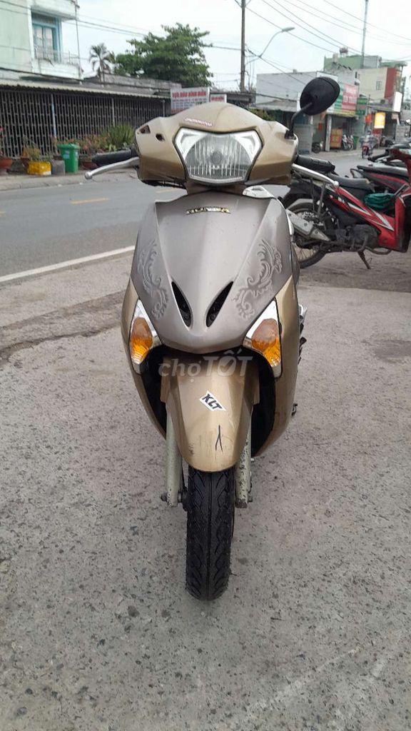 Honda Lead 110/2010 из бронзового золота