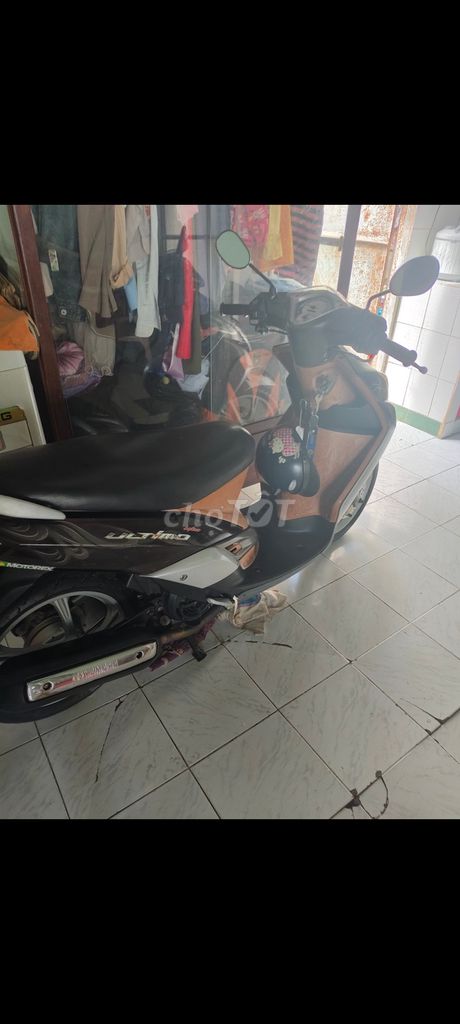 Yamaha Mio Ultimo 2011 Đen Nâu Bạc. Mua bán Xe máy tại Thành phố Thủ Dầu Một Bình Dương được đăng bởi Thái hoàng sanh hình 1