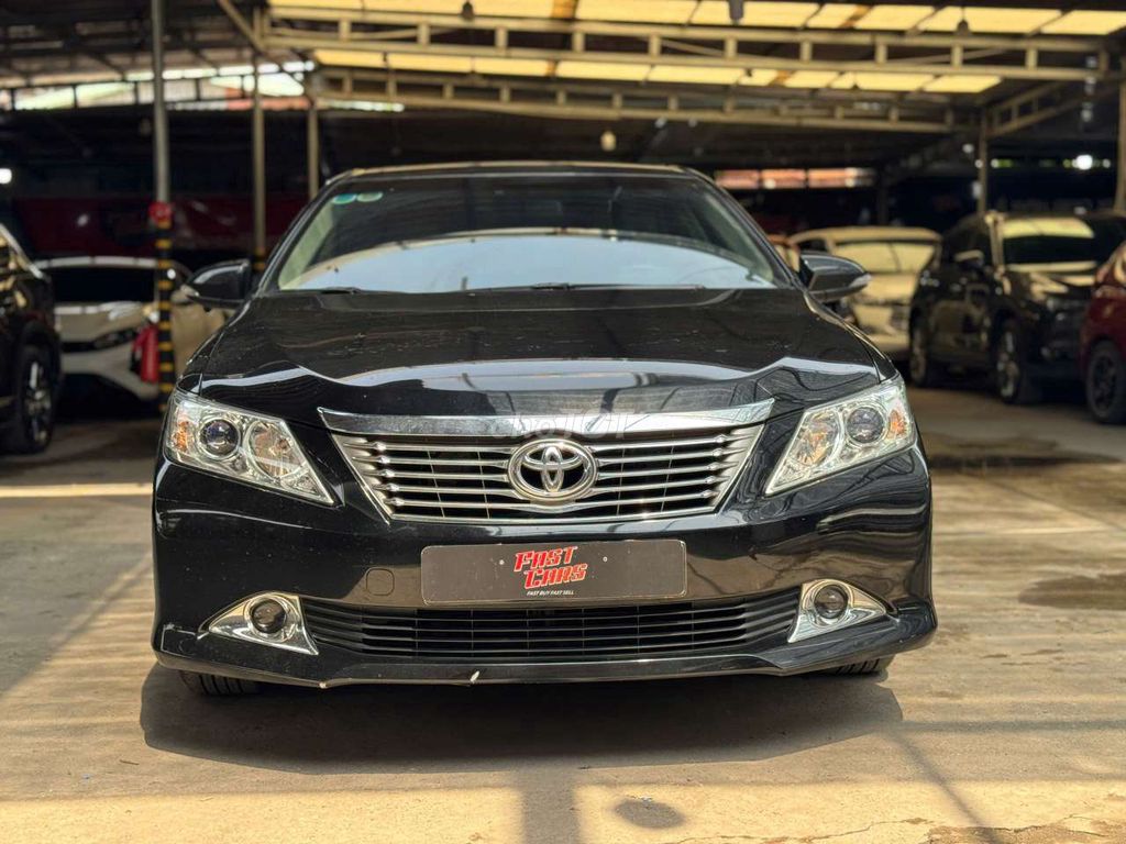 Toyota Camry 2013 2.0E, màu đen, lướt 41.000 km. Mua bán Ô tô tại Quận Bình Tân Tp Hồ Chí Minh được đăng bởi Son Do hình 1