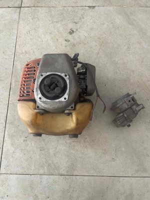 Động cơ 2 thì Chuông giảm tốc