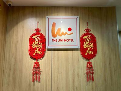 Khách Sạn THE UMI logo