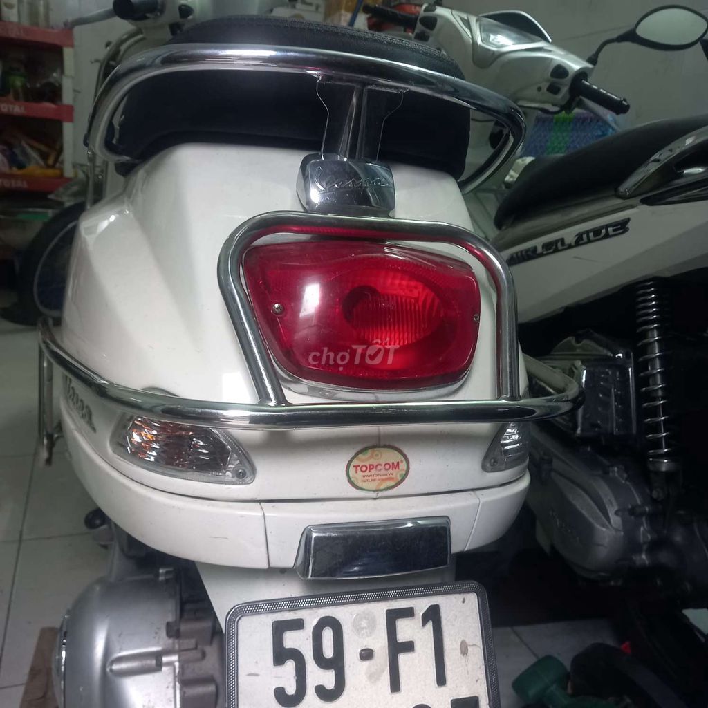 Piaggio Vespa LX 125 ie 2012 Trắng. Mua bán Xe máy tại Quận Gò Vấp Tp Hồ Chí Minh được đăng bởi NguyỄn VĂn HẬu hình 5