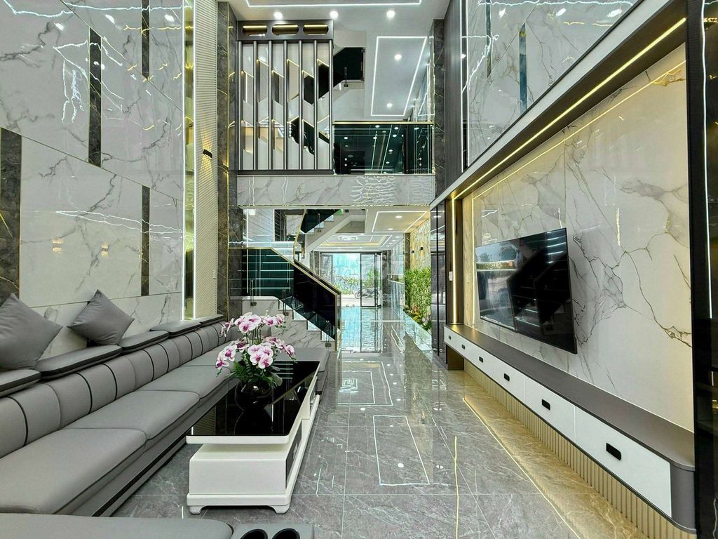 Siêu Phẩm 4m x 16m.Có Thang Máy và ô Chờ Hẻm rộng 14m Đường Thới An 16