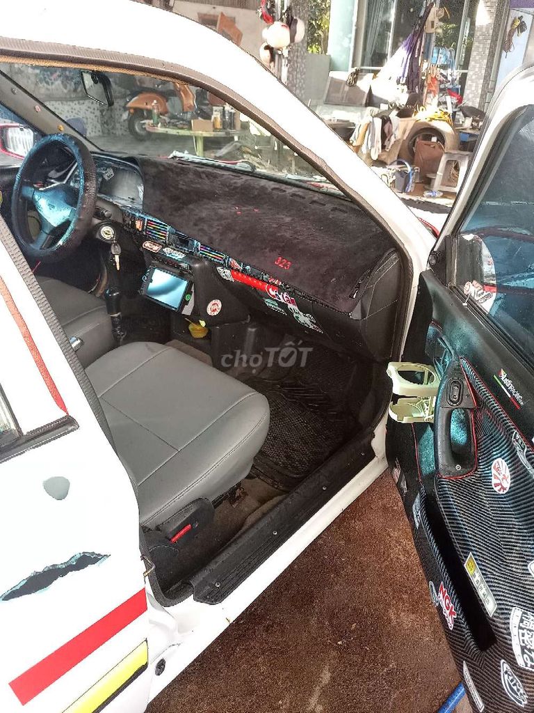 Mazda 323 Trắng 2000km. Mua bán Ô tô tại Huyện Krông Pắc Đắk Lắk được đăng bởi hau  hình 4