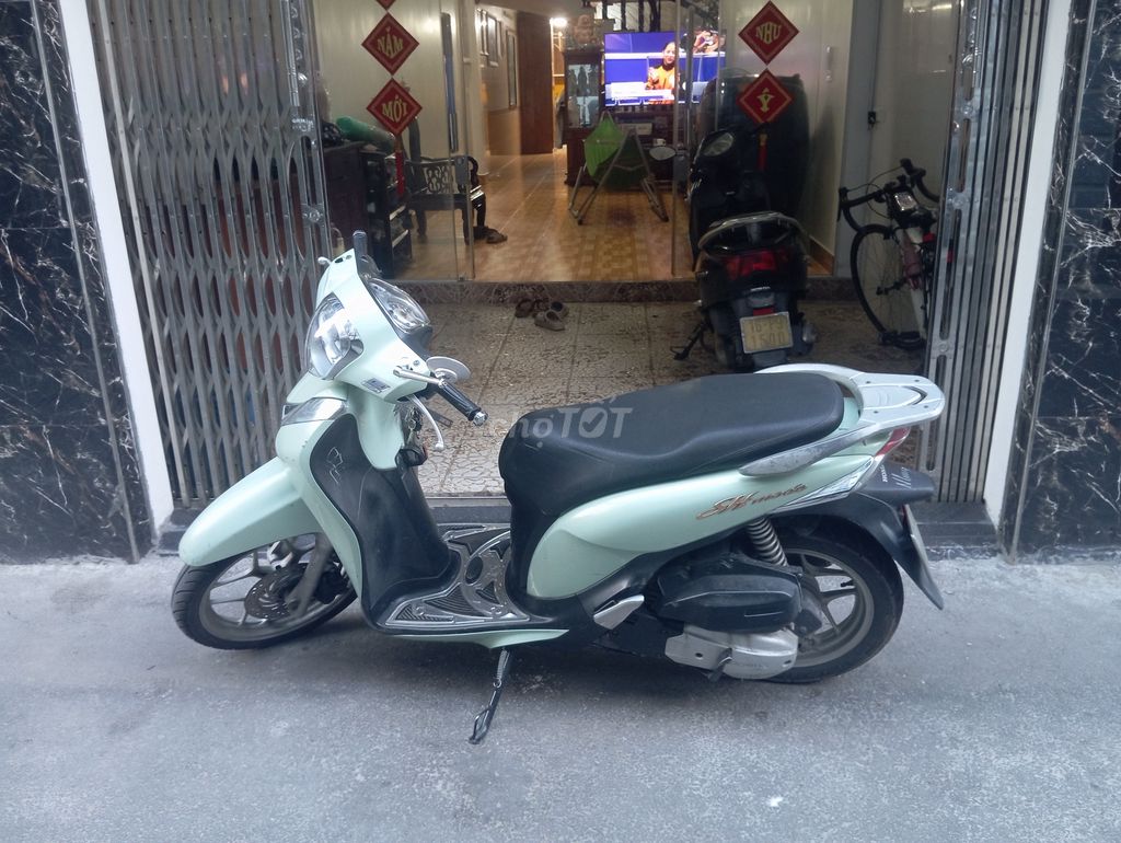 Honda SH Mode 2015 бирюзовый (женский)