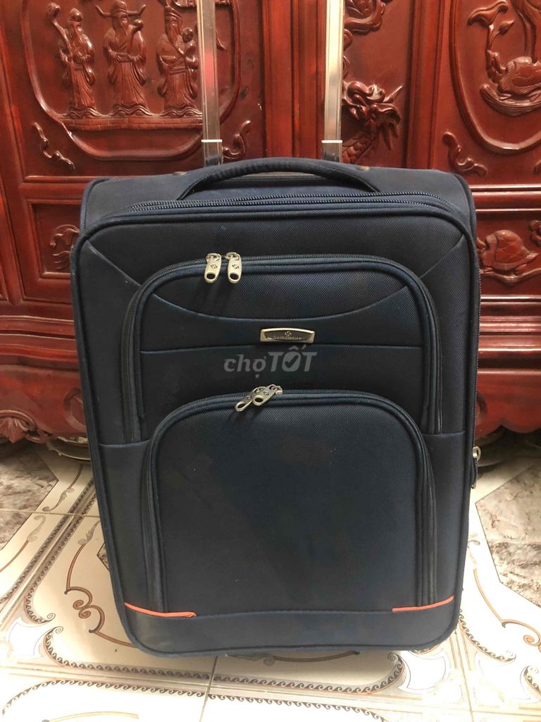 vali Samsonite tay kéo 360 độ