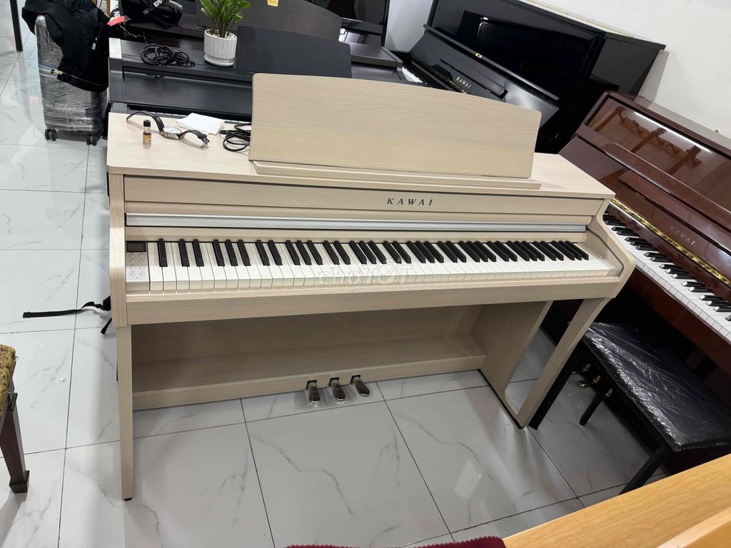 piano kawai CA49A mới kemg sx 2022 bh 2 năm