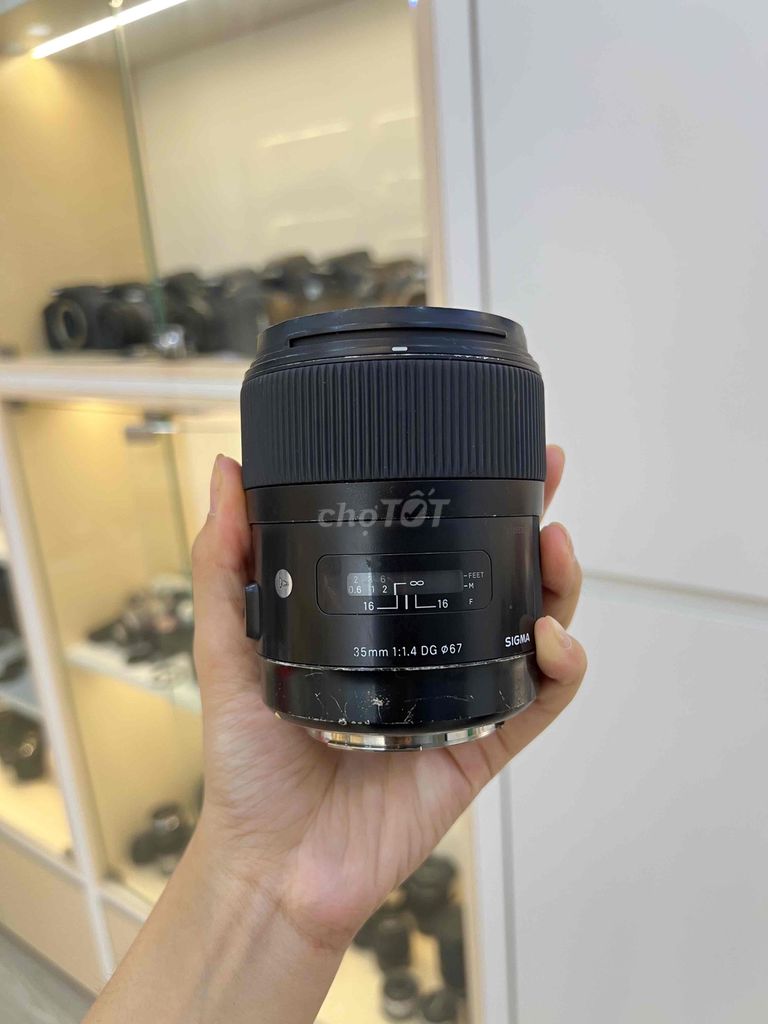 Ống kính Sigma 35mm f/1.4 DG Art Canon Đen. Mua bán Máy ảnh, Máy quay tại Quận Phú Nhuận Tp Hồ Chí Minh được đăng bởi Khánh máy ảnh top 1 hình 1