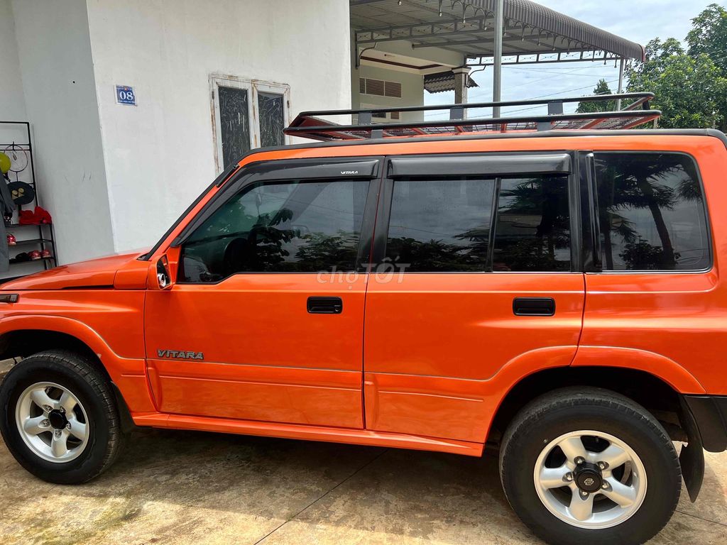 Suzuki Vitara JLX màu Cam. Mua bán Ô tô tại Huyện Krông A Na Đắk Lắk được đăng bởi Phạm Tiến Dũng hình 6