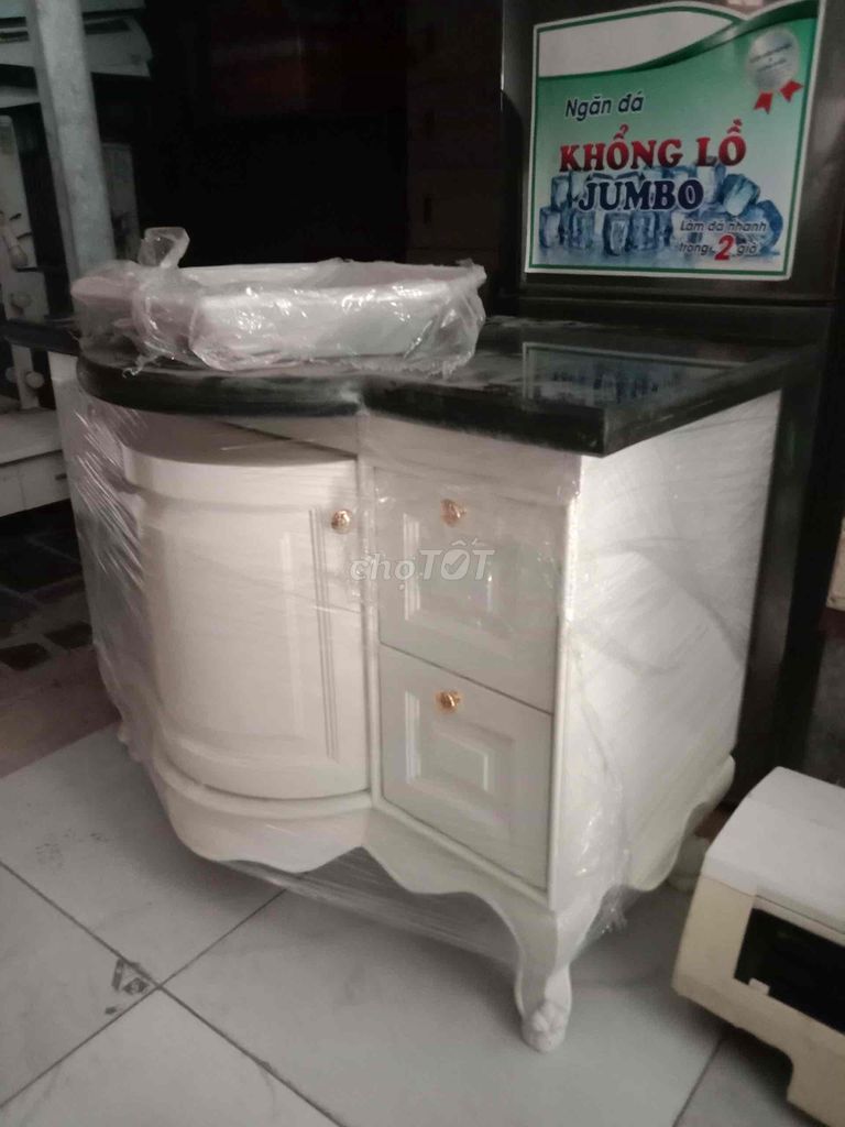 Tủ kệ + lavabo hieu Kohler mới 100%