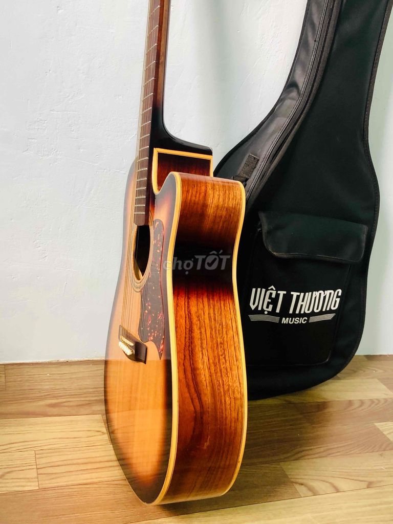 Guitar gỗ thịt tự nhiên giá mới 2tr thanh lý 900k