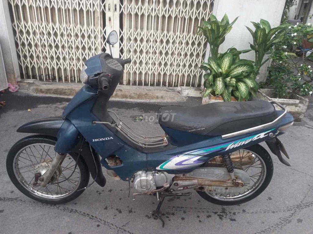 Синий мопед Honda Wave
