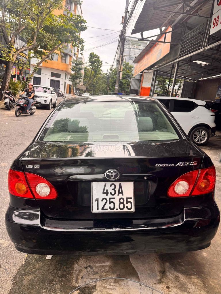 Toyota Corolla Altis 2002 черный 200 тыс. км