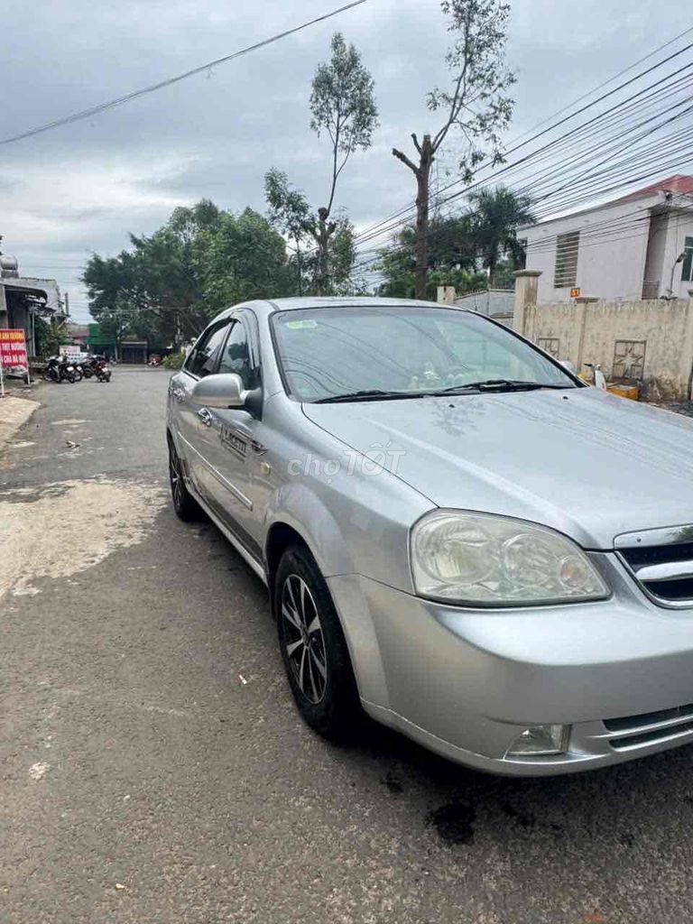 Daewoo Lacetti Số sàn 5 chỗ Bạc. Mua bán Ô tô tại Huyện Ea Kar Đắk Lắk được đăng bởi an khang hình 4