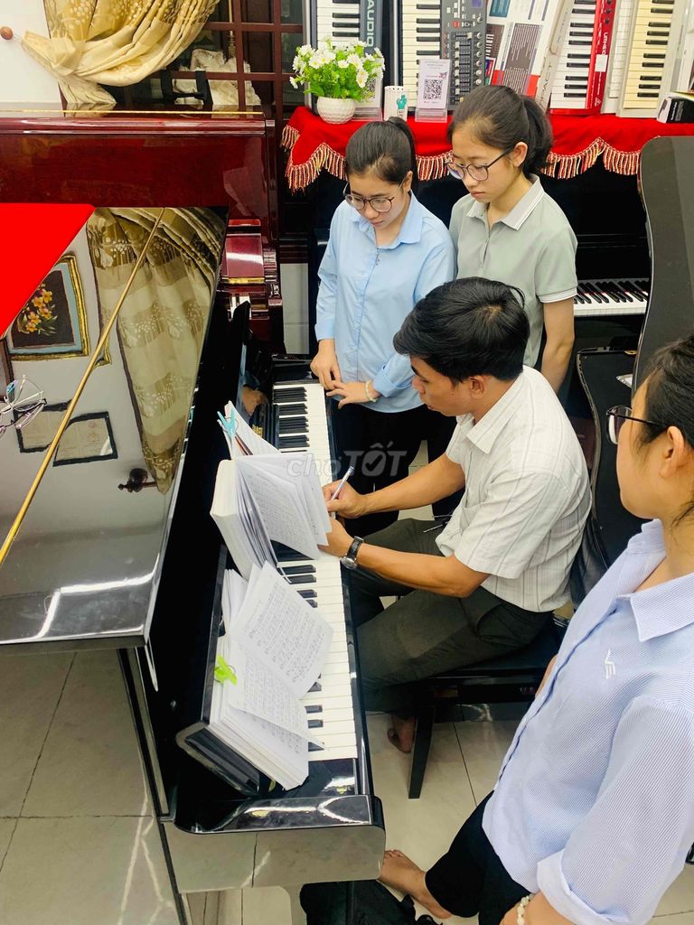 piano cơ kawai ku11