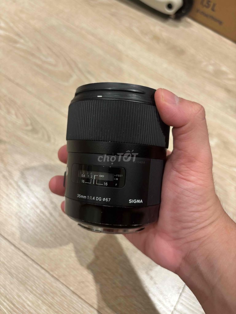 Sigma Art 35mm f/1.4 DG Canon Đen Kính xước dăm. Mua bán Máy ảnh, Máy quay tại Quận Phú Nhuận Tp Hồ Chí Minh được đăng bởi Lam Vy  hình 1