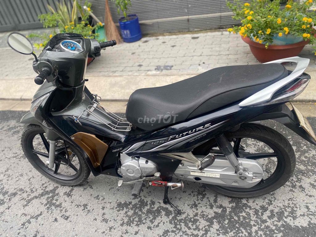 Future Fi(2013)bstp,chính chủ,xe zin êm ru,đẹp. Mua bán Xe máy tại Quận 7 Tp Hồ Chí Minh được đăng bởi Trung Anh hình 6