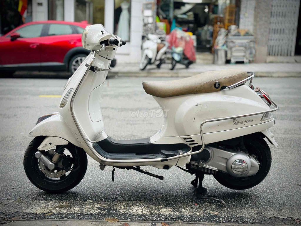 Piaggio Vespa LX 125 Trắng. Mua bán Xe máy tại Thành phố Huế Thừa Thiên Huế được đăng bởi DVCĐ Toàn Thắng hình 5