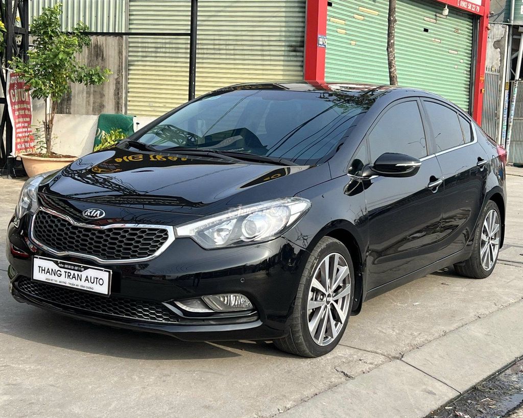 Kia K3 2014 photo 2