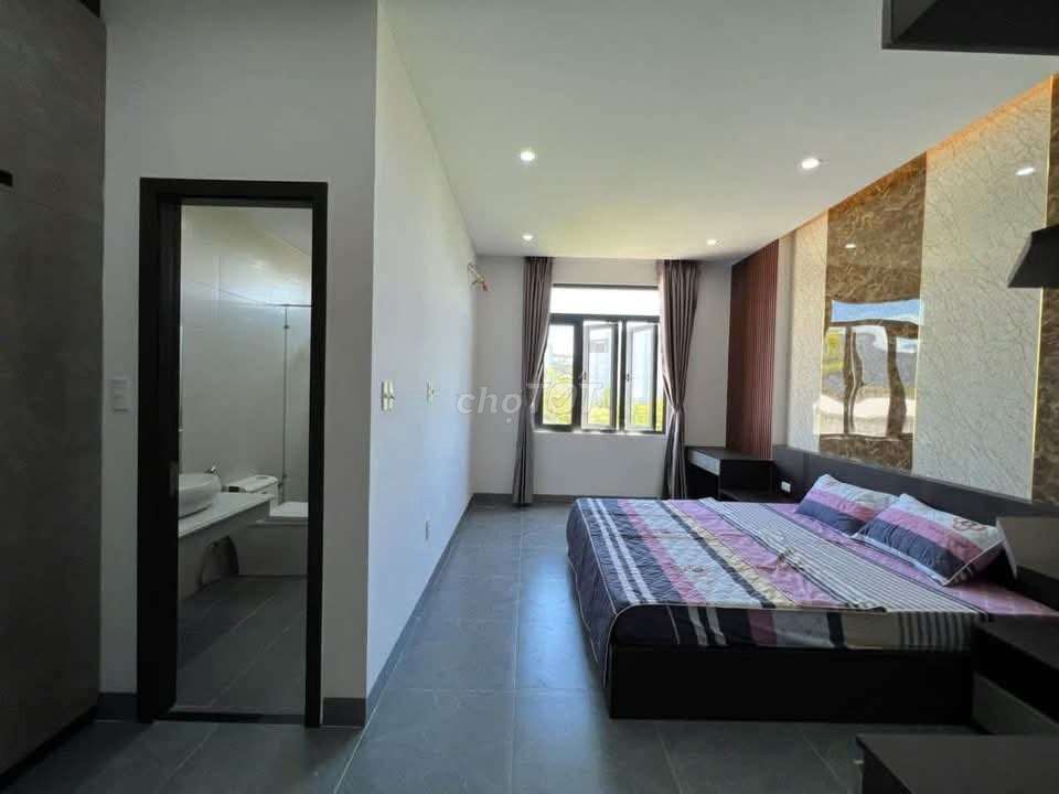 Furnished three-storey house with car yard in Hòa Xuân — photo 7