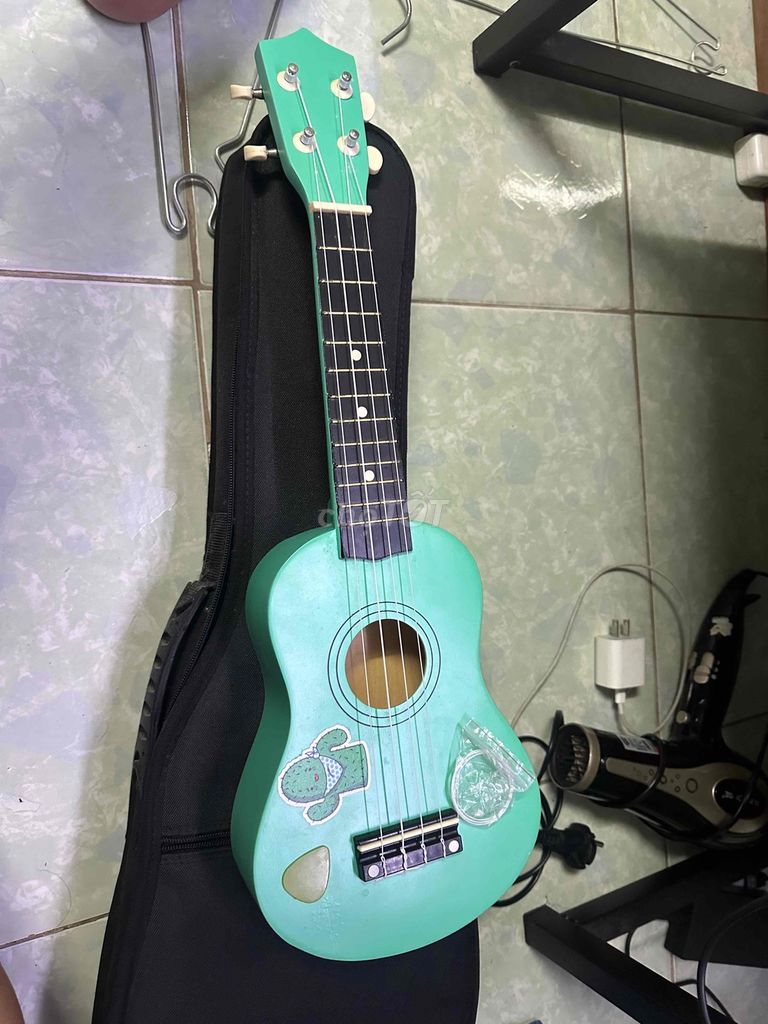Đàn Ukulele màu Xanh ngọc. Mua bán Nhạc cụ tại Huyện Hóc Môn Tp Hồ Chí Minh được đăng bởi quoc cuong hình 1