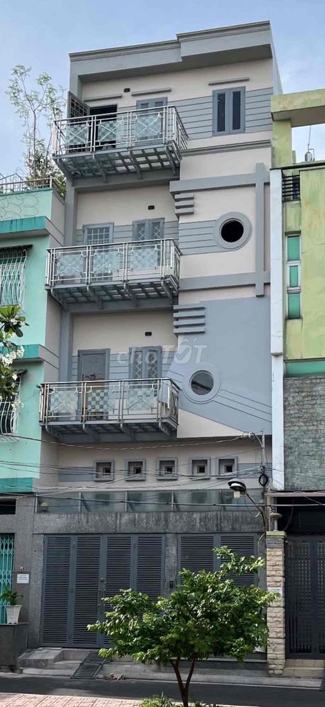 Cho thuê nhà hẻm xe hơi đường Âu Cơ, gần vòng xoay Lê Đại Hành