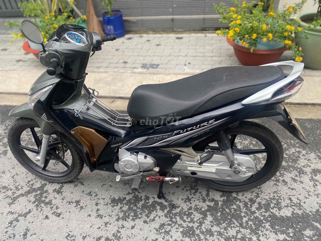 Future Fi(2013)bstp,chính chủ,xe zin êm ru,đẹp. Mua bán Xe máy tại Quận 7 Tp Hồ Chí Minh được đăng bởi Trung Anh hình 9