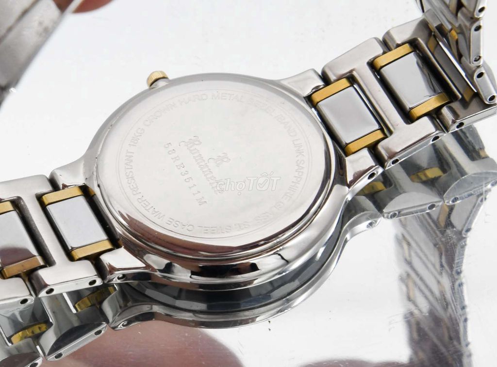Đồng hồ Romanette vỏ đá núm vàng đúc Thụy Sĩ
