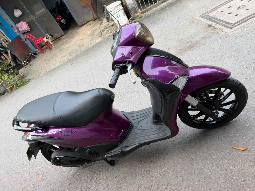 Piaggio Liberty 2011 màu Tím. Mua bán Xe máy tại Huyện Hóc Môn Tp Hồ Chí Minh được đăng bởi Hoàng Anh Tuấn hình 2