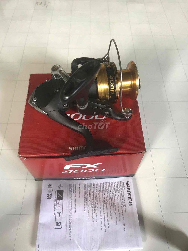Máy câu cá Shimano FX 4000 Đen, vàng