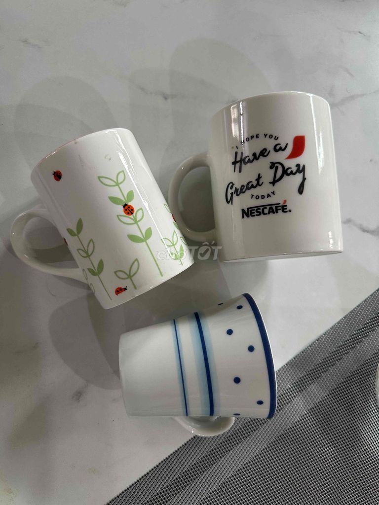Cốc sứ Nescafé Trắng Gốm sứ. Mua bán Dụng cụ nhà bếp tại Quận Hoàng Mai Hà Nội được đăng bởi Benz 2hand hình 1