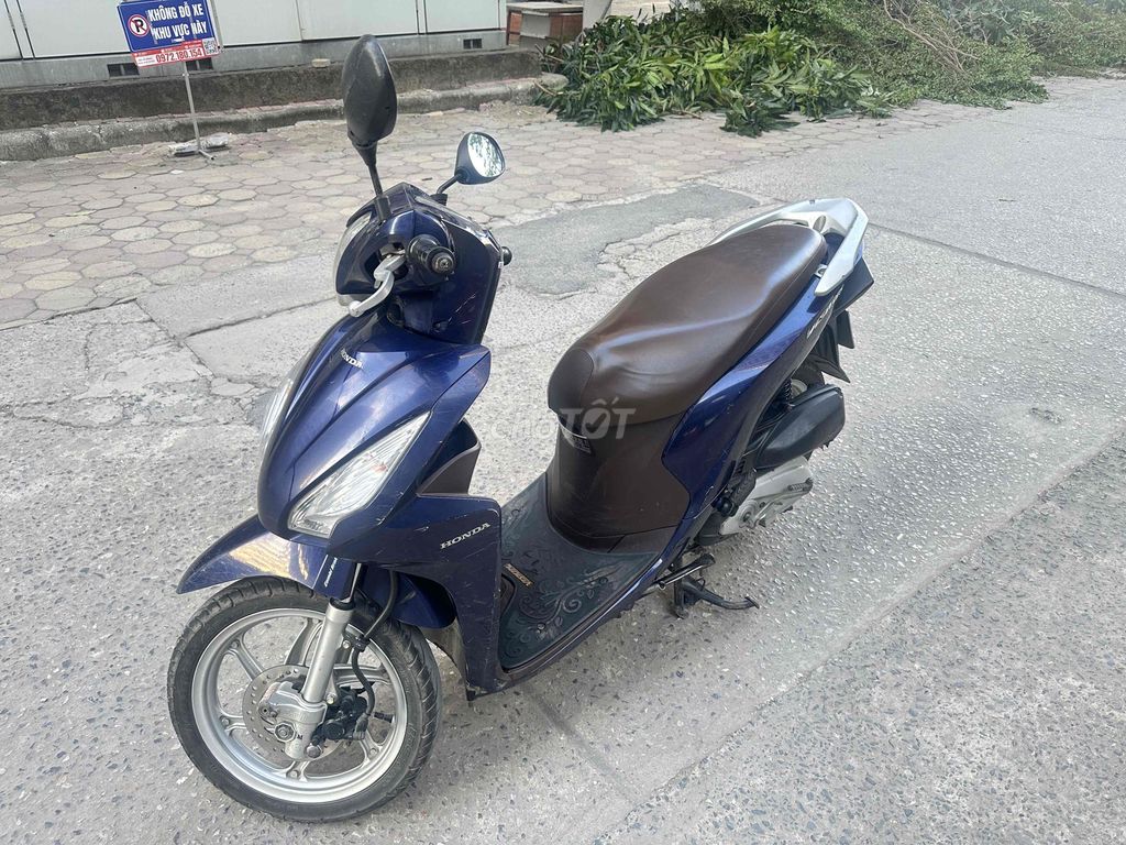 Скутер Honda Vision, синий