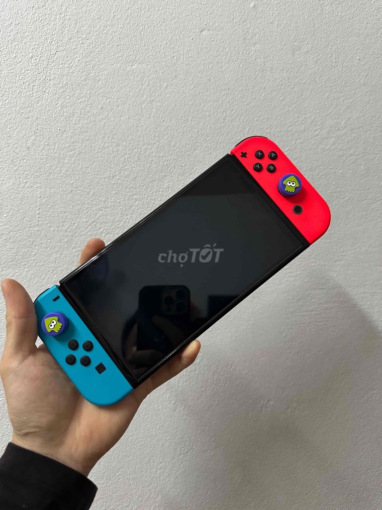 Máy chơi game Nintendo Switch OLED Đỏ Xanh. Mua bán Thiết bị chơi game tại Thành phố Hạ Long Quảng Ninh được đăng bởi Ngọc Nguyễn Hữu hình 1