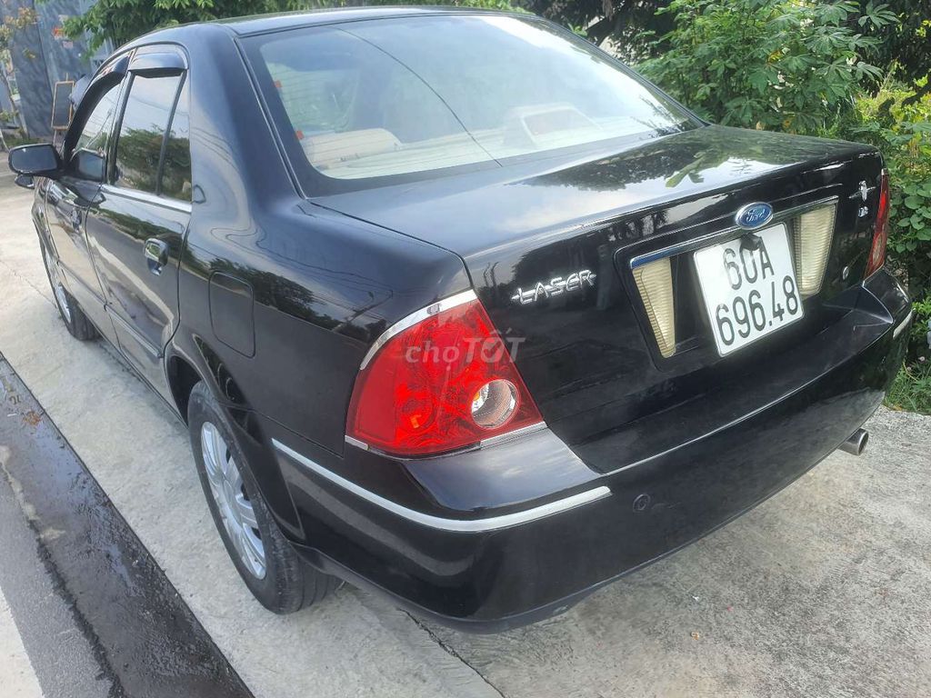 Ford Laser 2004 Đen. Mua bán Ô tô tại Huyện Củ Chi Tp Hồ Chí Minh được đăng bởi lê thanh hình 3